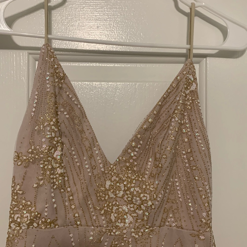 Beginning boutique formal maxi gown.